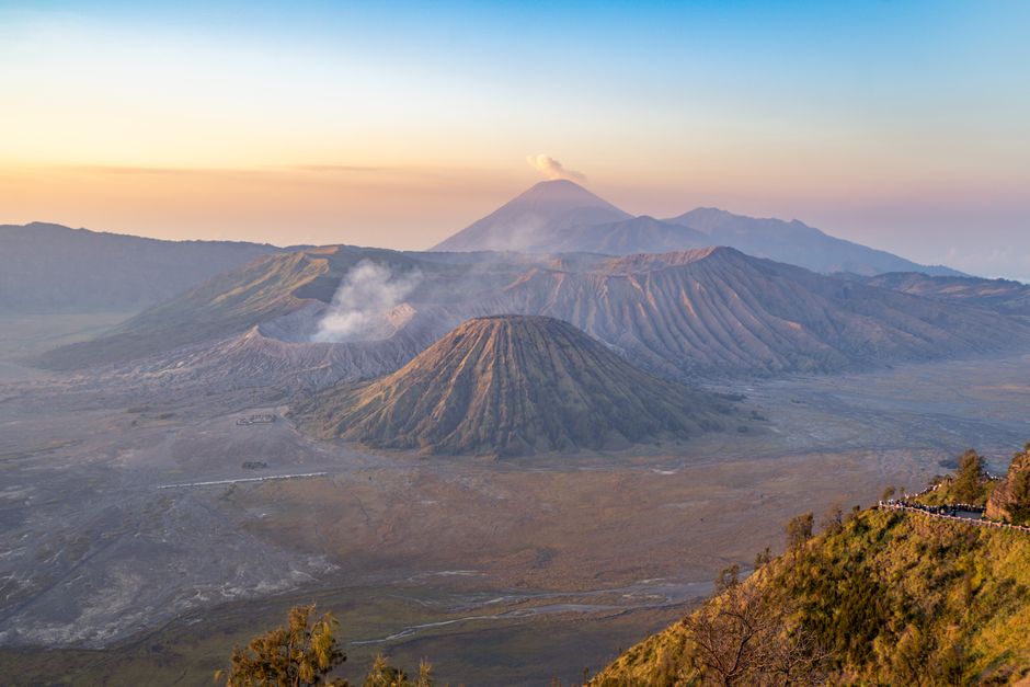 Traveler watching the sunrise over Mount Bromo